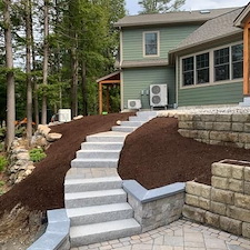 Granite-and-Paver-Hardscape-Design-with-Retaining-and-Sitting-Walls 1